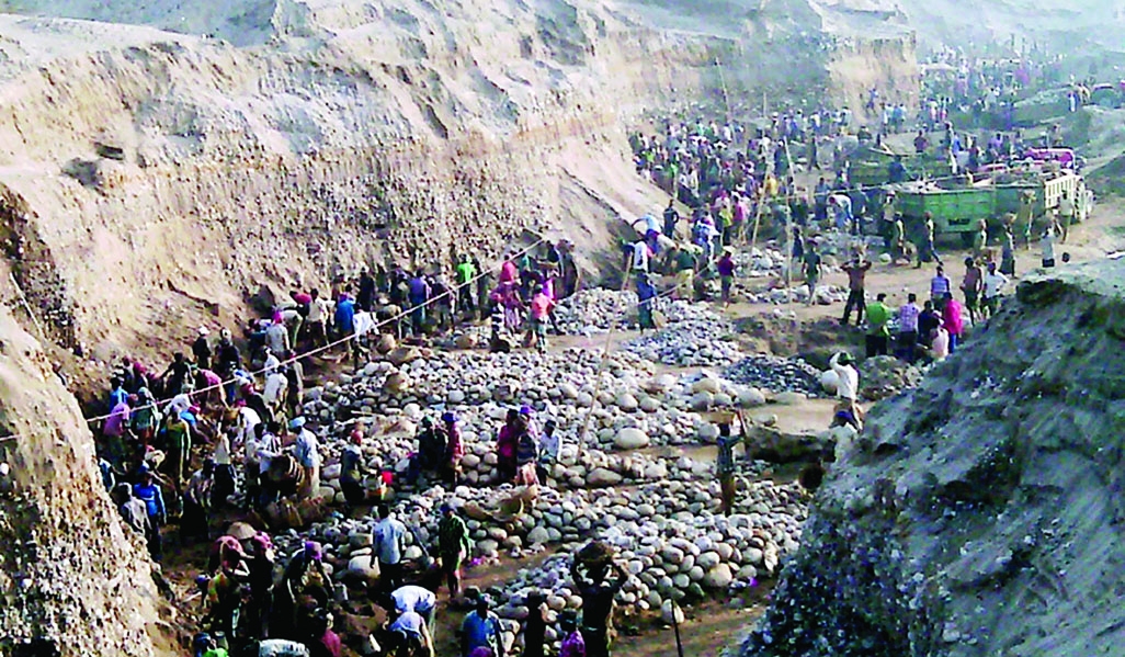 SYLHET: Illegal stone trading is going on at Bholaganj Railway premises of Companiganj in Sylhet though stone collection has been banned from here. This picture was taken on Monday. Banglar Chokh