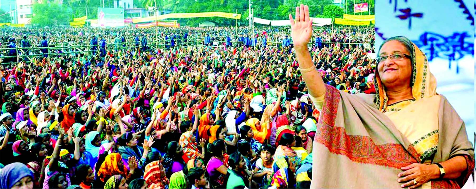 Prime Minister Sheikh Hasina waving to people at the public meeting held at Satkhira Govt High School ground on Monday.