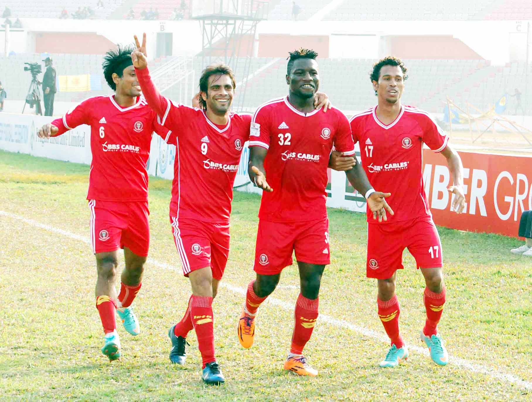 Players of Muktijoddha Sangsad Krira Chakra celebrate after scoring a goal against Chittagong Abahani Limited during their football match of the Bangladesh Premier League at the Bangabandhu National Stadium on Tuesday.