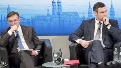 There were testy exchanges between Un Kozhara (left) and Un Klitschko at the security summit.