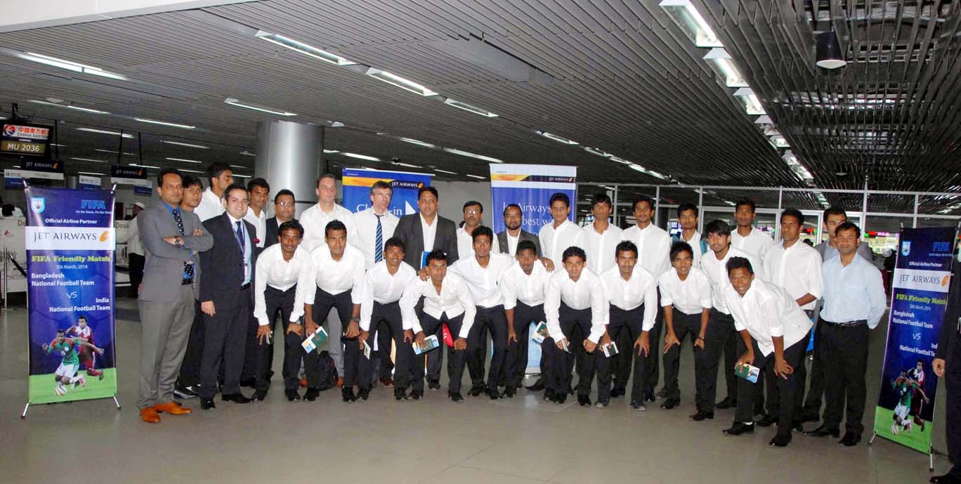 Members of Bangladesh National Football team pose for a photograph at the Shahjalal International Airport on Sunday before leaving for India to play a FIFA friendly football match against Indian National Football team at Goa in India on March 5.