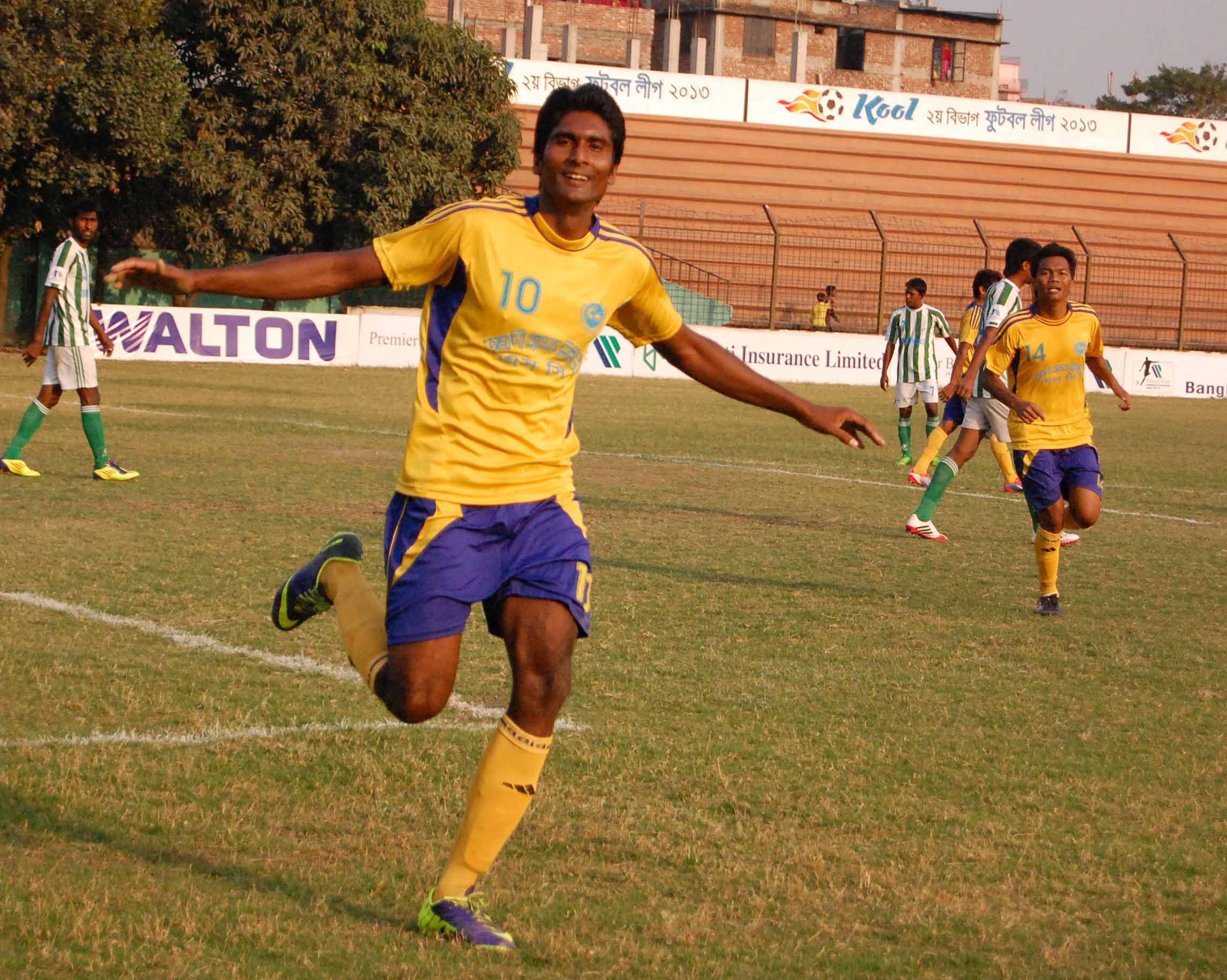 Titu of Agrani Bank SC celebrates after scoring a hat-trick against Badda Jagarani Sangsad in the football match of the Premier Bank Bangladesh Championship League held at the Bir Sreshtha Shaheed Sepoy Mohammad Mostafa Kamal Stadium in Kamalapur on Wedne