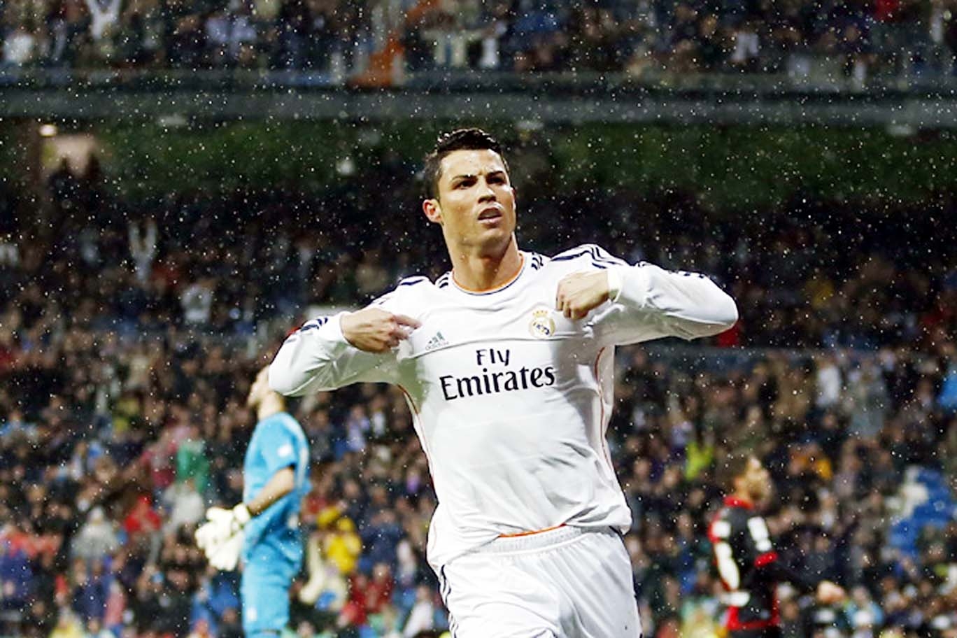 Real Madrid's Cristiano Ronaldo celebrates his goal during a Spanish La Liga soccer match between Real Madrid and Rayo Vallecano at the Santiago Bernabeu stadium in Madrid, Spain on Saturday.