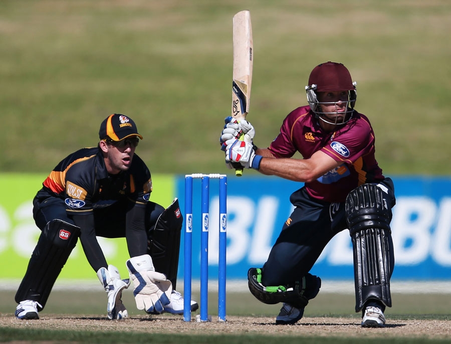 Brad Wilson gets ready to sweep during his 68 during the Ford Trophy final match between Northern Districts and Wellington at Mount Maunganui on Saturday.