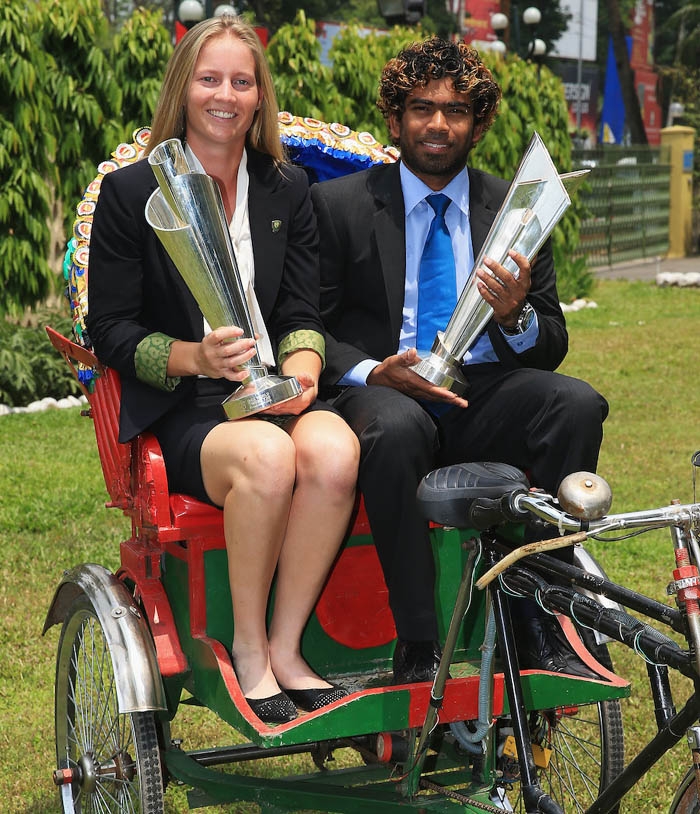 Meg Lanning, Captain of Australia Women Cricket team and Lasith Malinga, Captain of Sri Lanka Cricket team pose with their trophies in Dhaka on Monday.