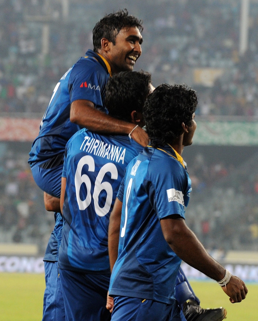 Mahela Jayawardene bids farewell to T20Is as he is carried around the field after winning the World T20 Cup in Mirpur on Sunday.