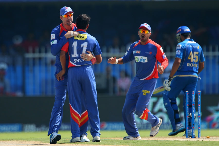 Mohammed Shami is congratulated after getting Rohit Sharma run-out during the IPL 2014 between Daredevils and Mumbai Indians at Sharjah on Sunday.Delhi won by 6 wickets with 7 balls remaining.