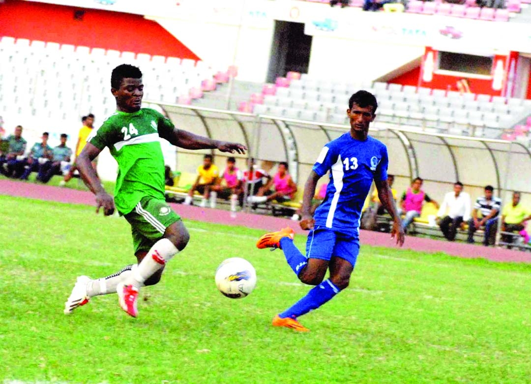 A scene from the Nitol Tata Bangladesh Premier Football League match between Team BJMC and Sheikh Russel KC Ltd at the Bangabandhu National Stadium on Friday. Team BJMC won the match by 2 - 1.
