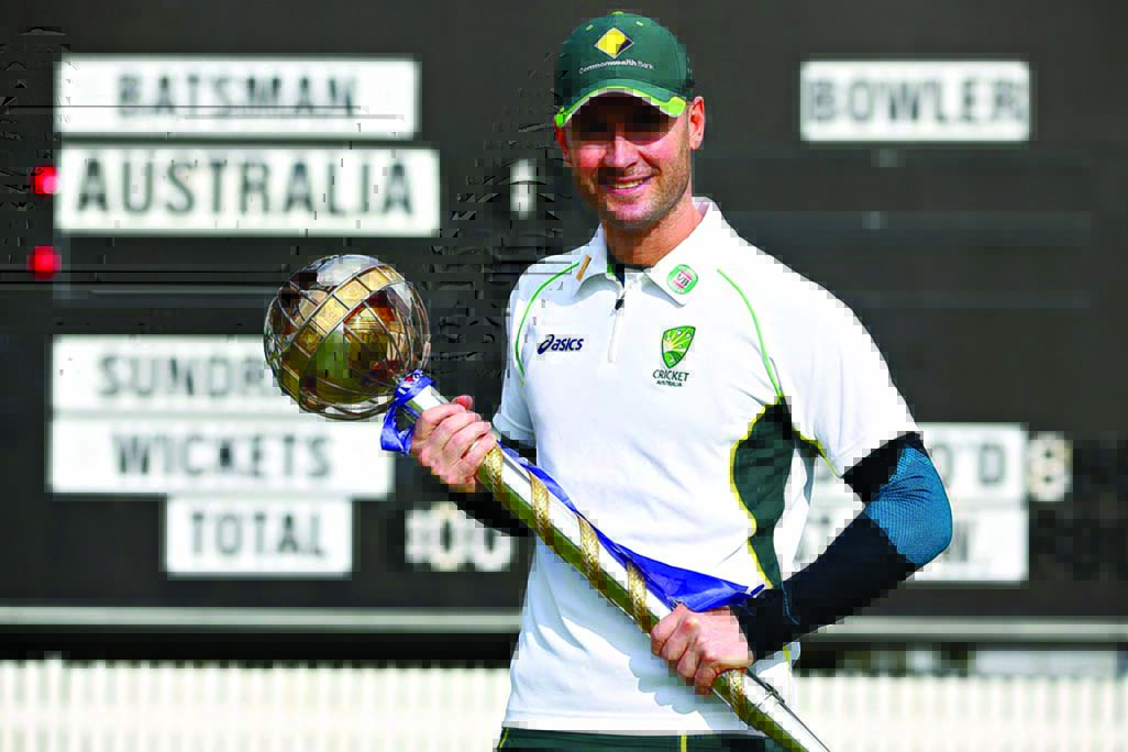 Michael Clarke with the ICC's Test mace at Brisbane on Tuesday.