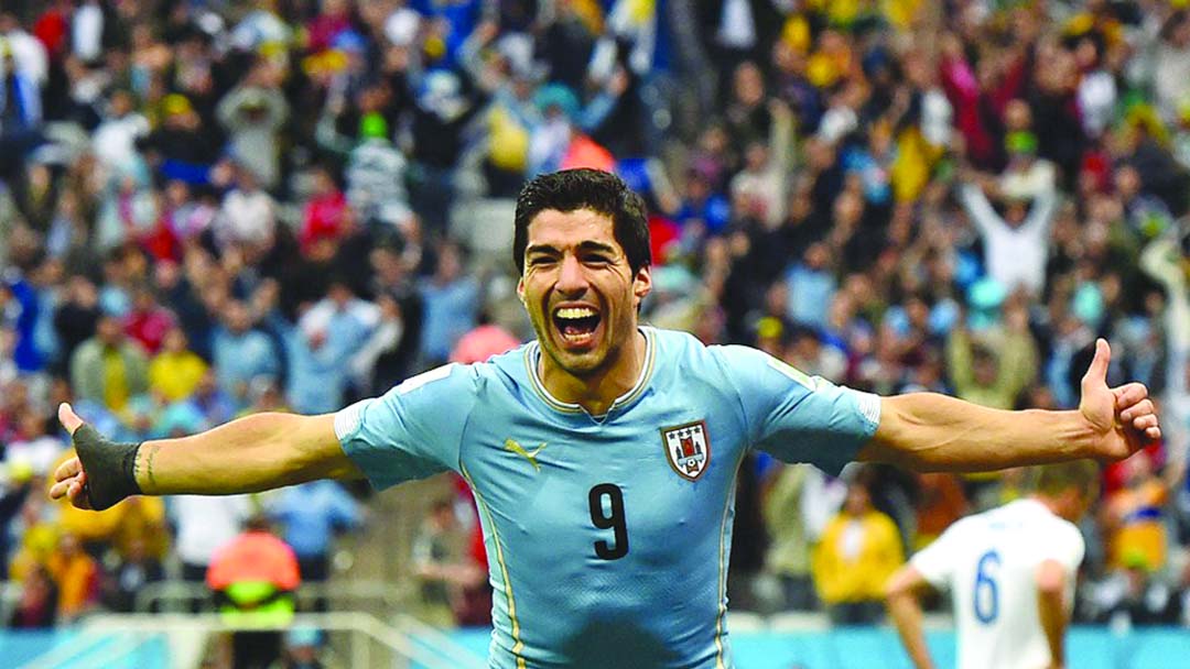 Uruguay's forward Luis Suarez celebrates scoring during the Group D football match between Uruguay and England at the Corinthians Arena in Sao Paulo during the 2014 FIFA World Cup on Thursday.