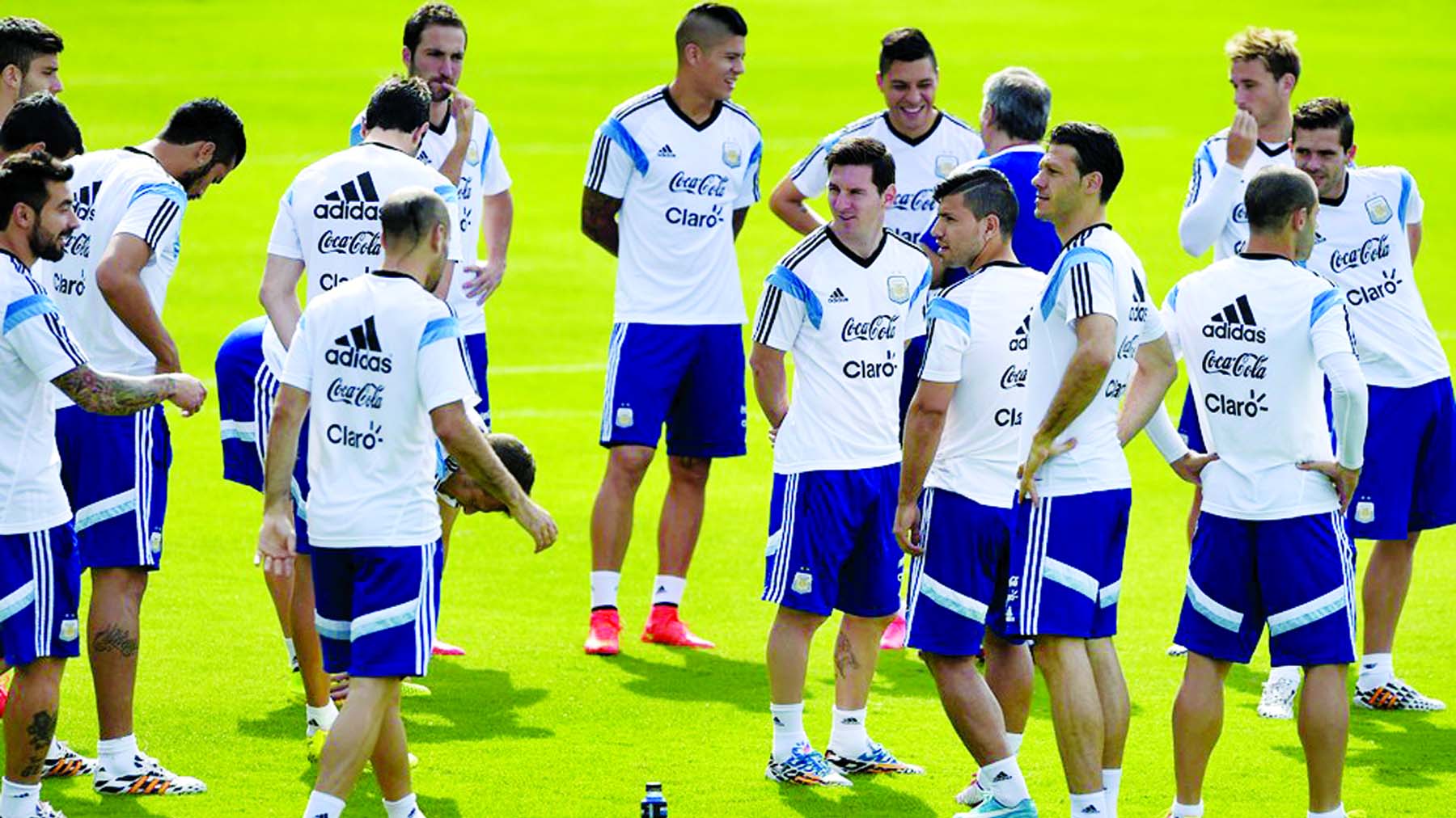 Argentina's forward Lionel Messi is pictured with team-mates as they gather for a training session at "Cidade do Galo", their base camp in Vespasiano, near Belo Horizonte on Wednesday ahead their 2014 FIFA World Cup Group F football match against Iran