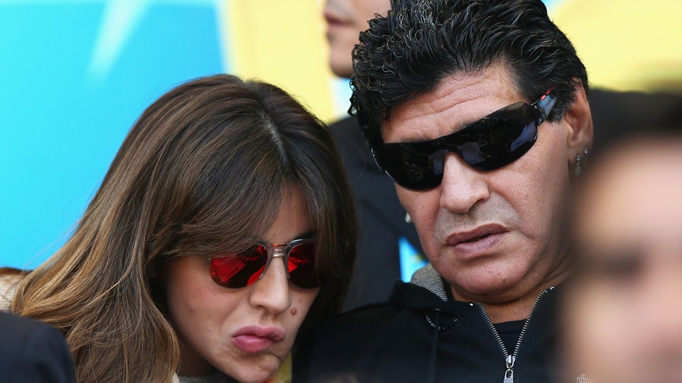 Diego Maradona Â® and his daughter Giannina Maradona look on during the 2014 FIFA World Cup Brazil Group F match between Argentina and Iran at Estadio Mineirao in Belo Horizonte, Brazil on Saturday.