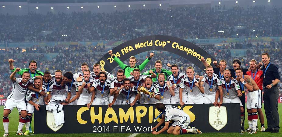 Players of Germany celebrate with the World Cup trophy after defeating Argentina 1-0 in extra time during the 2014 FIFA World Cup Brazil final match between Germany and Argentina at Maracana in Rio de Janeiro, Brazil on Sunday.