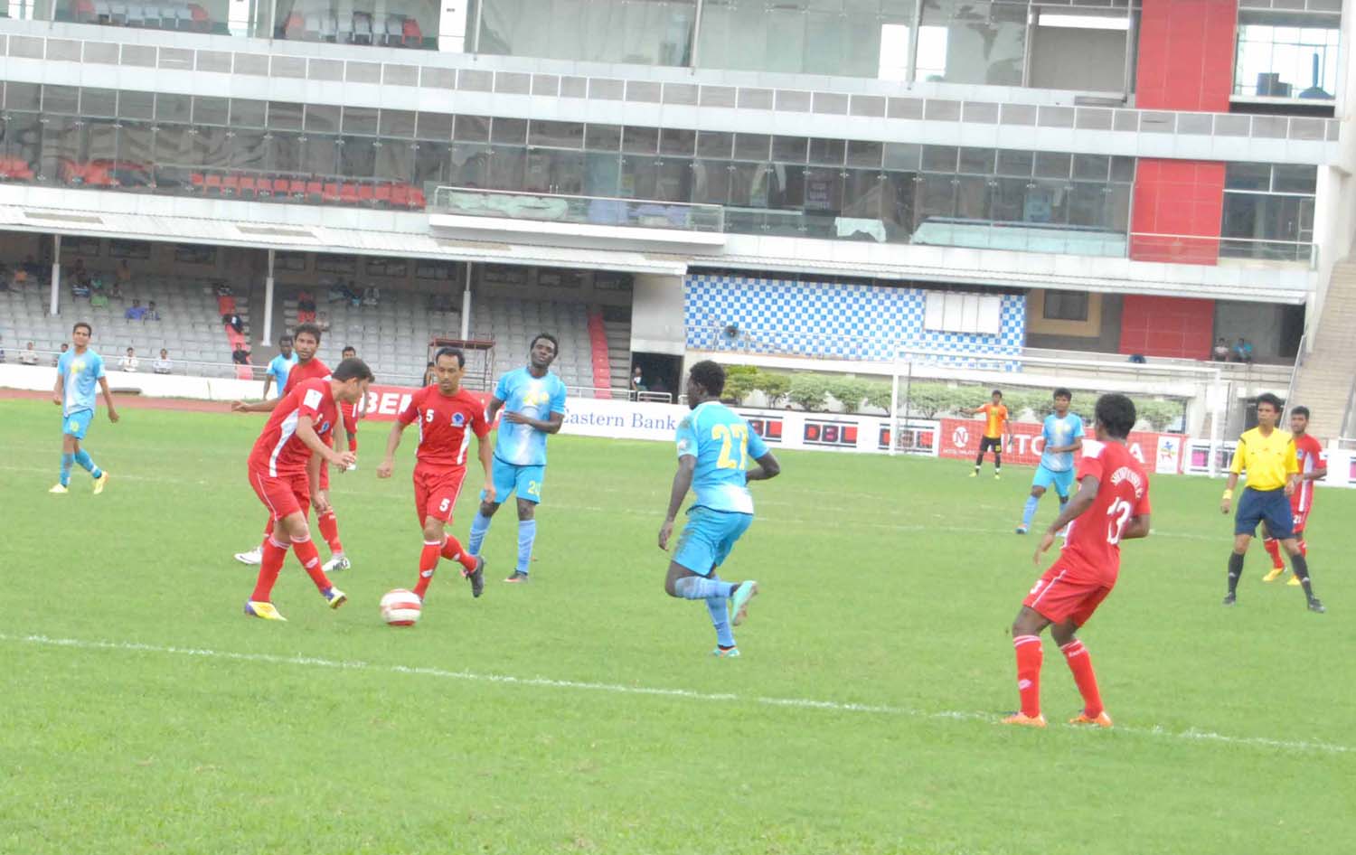 A scene from the match of the Nitol Tata Bangladesh Premier Football League between Dhaka Abahani Limited and Sheikh Russel Krira Chakra at the Bangabandhu National Stadium on Saturday. Abahani won the match 5-2.