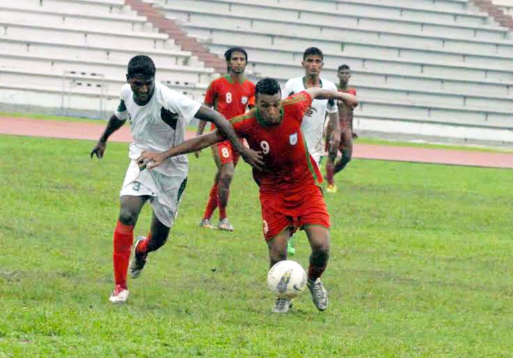 A scene from the practice football match between Bangladesh Under-23 National Football team and Bangladesh Army Football team at the Bangladesh Army Stadium in Banani on Thursday. Bangladesh Under-23 National Football team won the match 3-1.