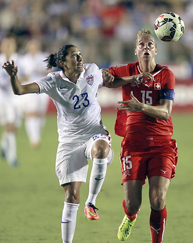 United States' Christen Press (23) and Switzerland's Caroline Abbe (15) vie for the ball during the second half of an international friendly soccer game on Wednesday in Cary, NC. The United States won 4-1.