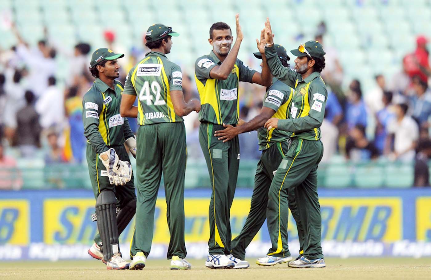 Farveez Maharoof of Southern Express celebrates the wicket of Nasir Jamshed of Lahore Lions during the qualifier 5 match of the Oppo Champions League Twenty20 between the Southern Express and the Lahore Lions held at the Chhattisgarh International Cricket