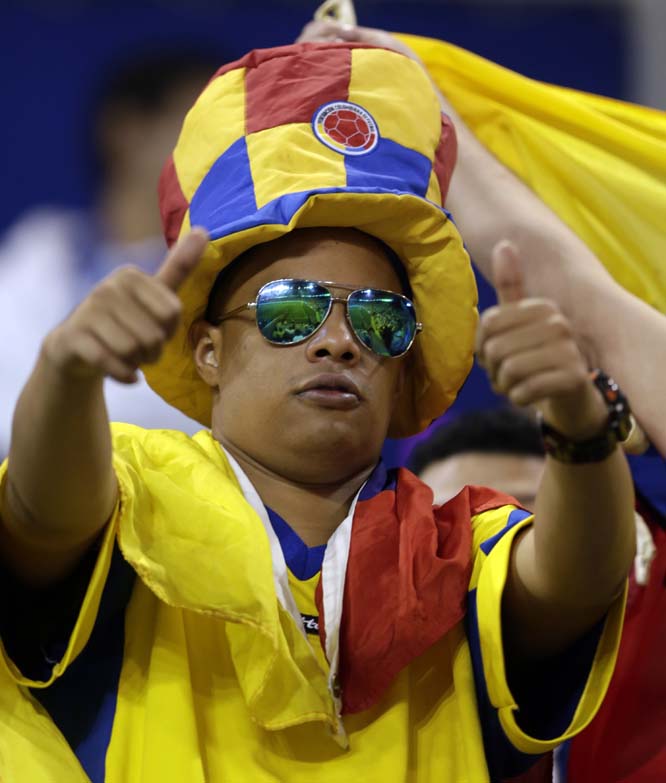 A fan poses for photographers prior to an international soccer friendly match between Colombia and Canada on Tuesday in Harrison NJ.
