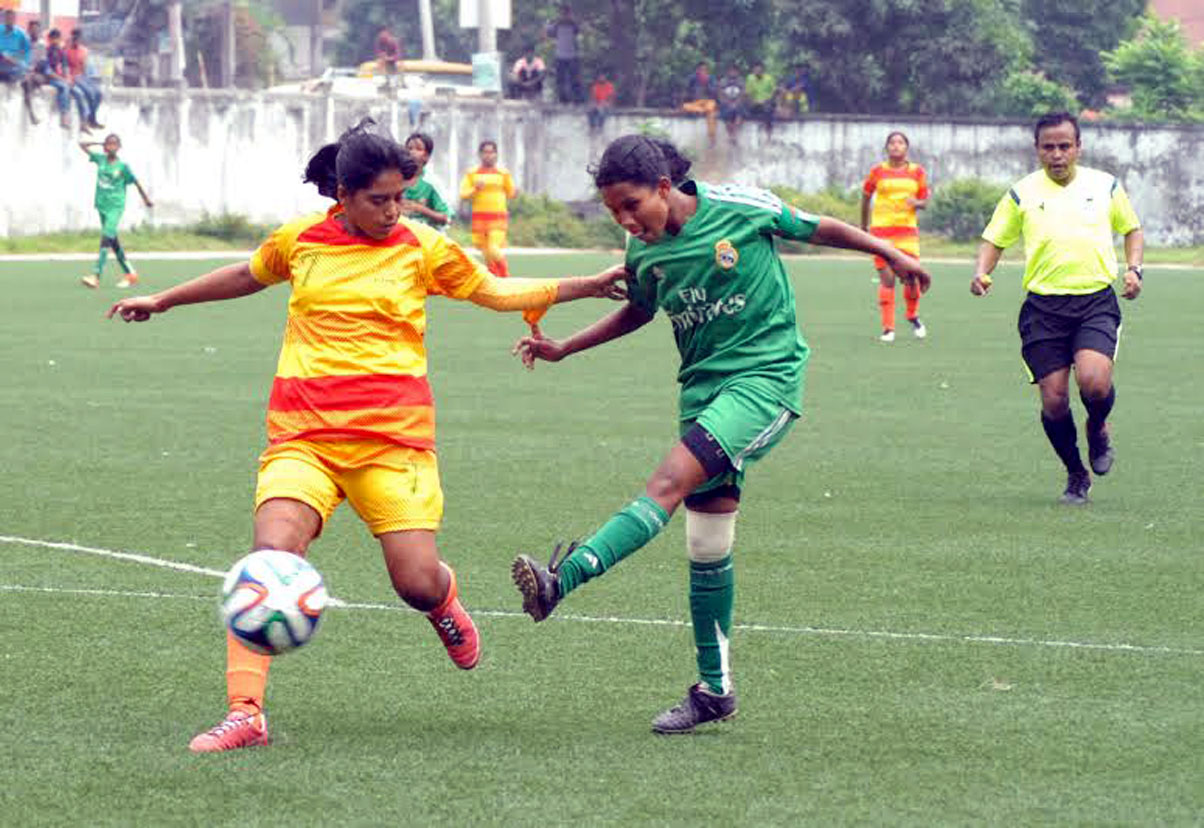 A scene from the match of the KFC National Women's Super League between Mymensingh District team and Team BJMC at the BFF Artificial Turf on Thursday. Mymensingh won the match 3-2.