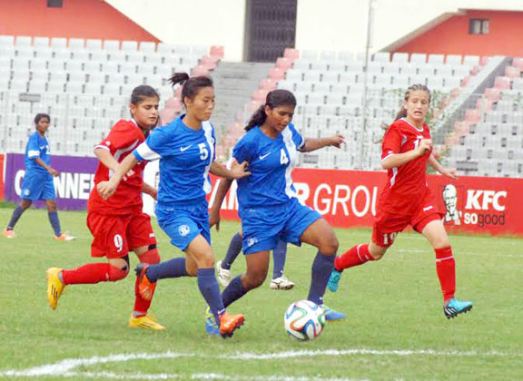 An action from the match of the AFC Under-16 Women's Championship Qualifiers between India Under-16 National Women's Football team and Jordan Under-16 National Women's Football team at the Bangabandhu National Stadium on Thursday.