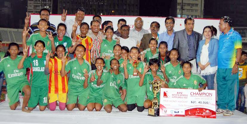 Members of Mymensingh District team, the champions of the KFC National Women's Football League pose for a photograph at the Bangabandhu National Stadium on Saturday.