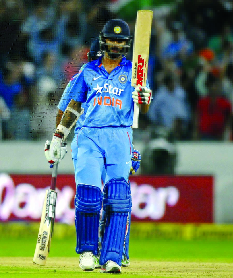 Shikhar Dhawan raises his 10th ODI fifty during the 3rd ODI between India and Sri Lanka at Hyderabad on Sunday.