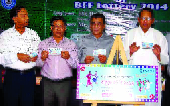 (From right to left) :Minister for Information Hasanul Haq Inu, MP, President of Bangladesh Football Federation (BFF) Kazi Salahuddin, Senior Vice-President of BFF Abdus Salam Murshedy and Member of BFF Harun-ar-Rashid showing lotteries of BFF at the BFF