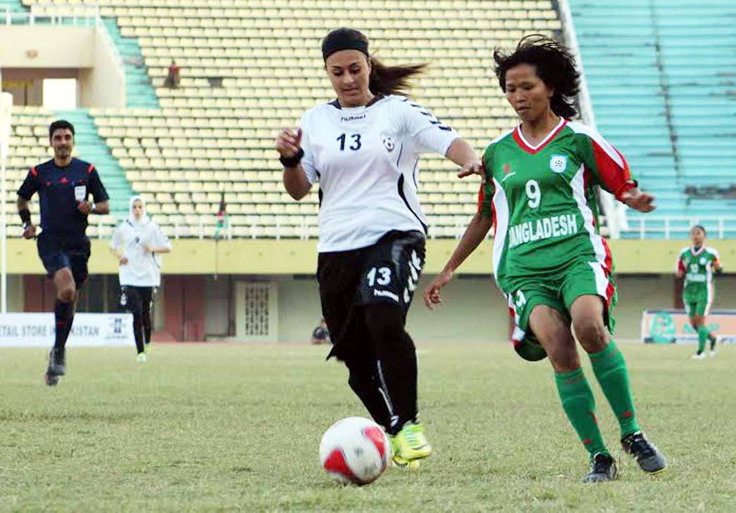 A scene from the SAFF Women's Football Championship between Bangladesh National Women's Football team and Afghanistan National Women's Football team at the Jinnah Football Stadium in Islamabad, Pakistan on Thursday.