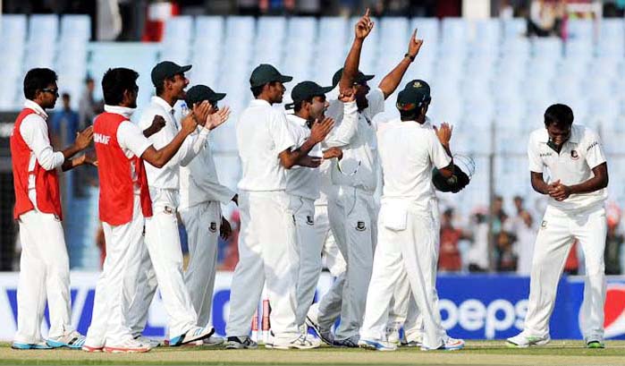 Bangladeshi players celebrate the wicket of Brian Chari on review on the 2nd day of 3rd Test between Bangladesh and Zimbabwe at Chittagong on Thursday.