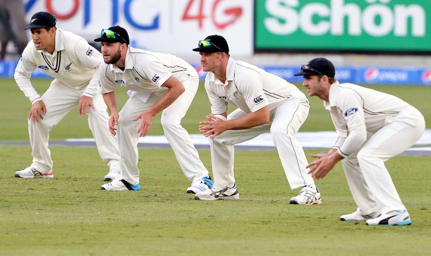 New Zealand cricketers Kane Williamson (R), Corey Anderson (2R), Mark Craig (2L) and Ross Taylor field in slip position during the second day of the second Test match between Pakistan and New Zealand at Dubai International Stadium in Dubai on Tuesday. New