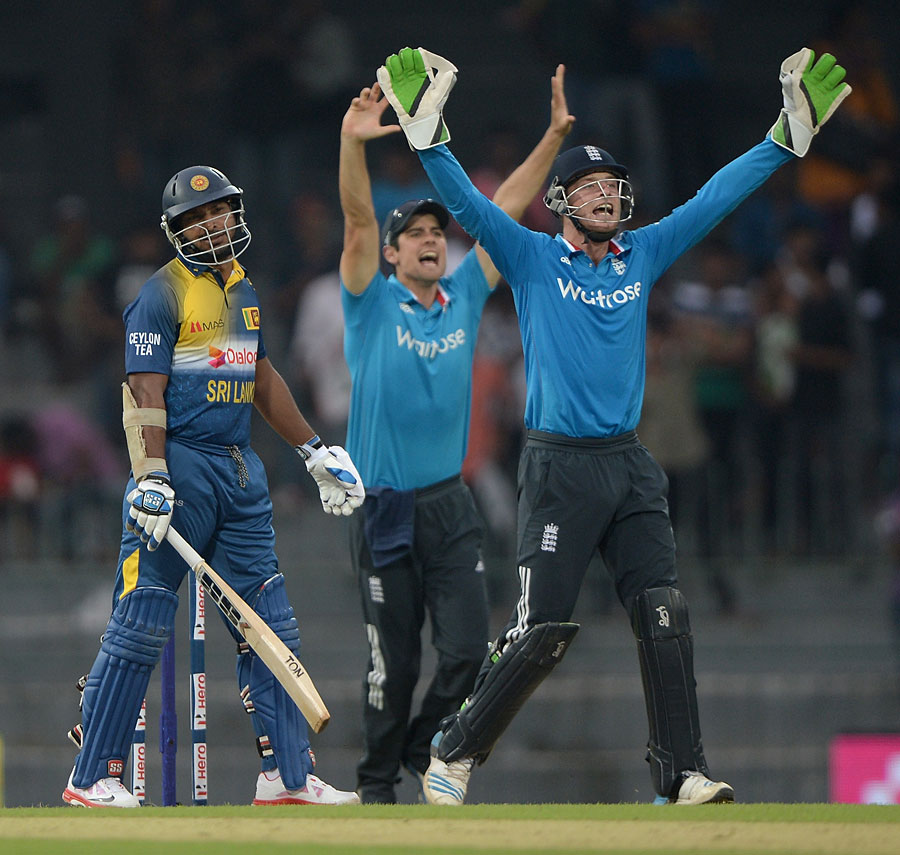 England successfully appeal for lbw against Kumar Sangakkara during the 1st ODI between Sri Lanka and England in Colombo on Wednesday. Sri Lanka scored 317 for 6 in their stipulated 50 overs.