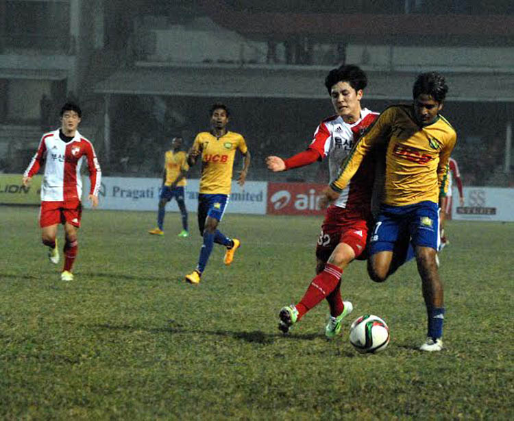 An action from the FIFA international friendly football match between Sheikh Jamal Dhanmondi Club and Busan Iâ€™Park of South Korea at the Bangabandhu National Stadium on Saturday.