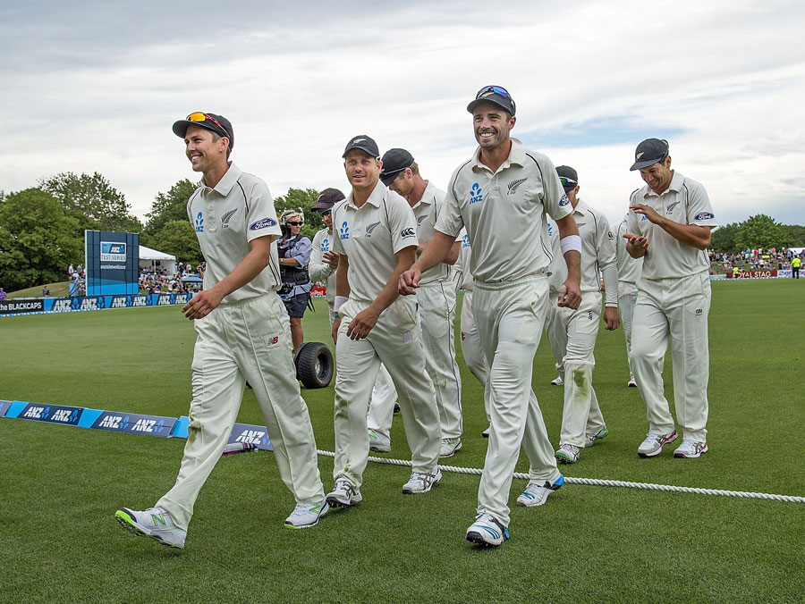 Trent Boult and Tim Southee lead the team off the field on the 2nd day of 1st Test between New Zealand and Sri Lanka at Christchurch on Saturday.