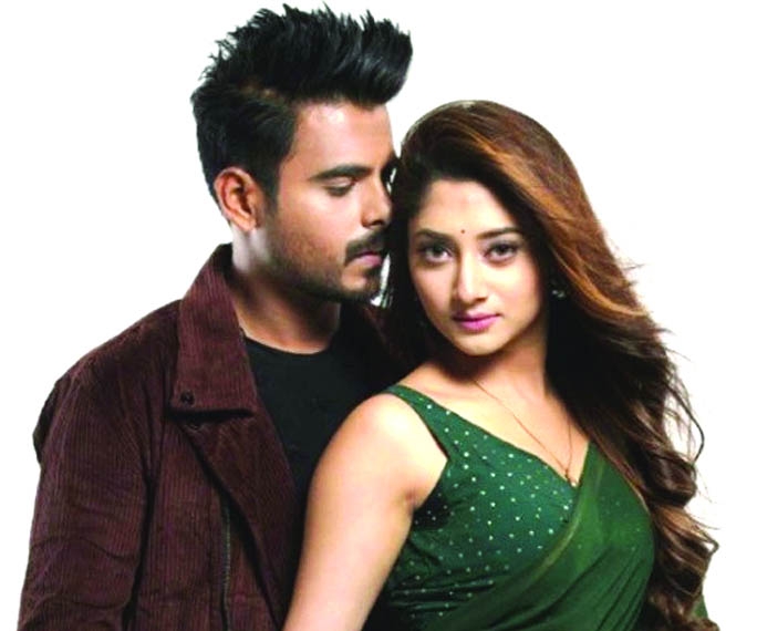 Siam Ahmed and Puja Cherry in a scene from movie Shaan