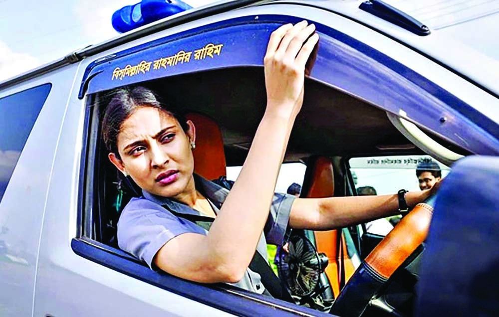 Mehazabien Chowdhury in a scene from upcoming Eid special fiction drama where the actress portrays the role of a brave ambulance driver named Meghla.