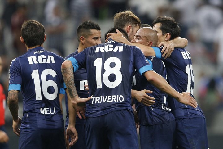 Argentina's Racing Club players celebrates at the end of a Copa Sudamericana soccer match against Brazil's Corinthians in Sao Paulo, Brazil on Wednesday.