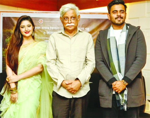 From left to right: Actress Pori Moni, writer Dr Muhammad Jafar Iqbal and actor Siam Ahmed at a photo session on the trailer releasing of the movie