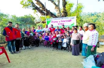 A view of the clothes, medicine and education materials distribution programme of Rezaul Karim Sikder Foundaton in Chattogram Hill Tracts zone recently.
