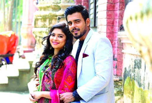 Zinia Zafrin Luipa and Siam Ahmed in a scene from music video of Luipa’s song ‘Gentleman’