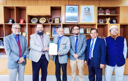 Mohammad Emran Hossain, Member of the Board of Trustees of Daffodil International University is handing over the certificate of permanent establishment and management of the University issued by the Ministry of Education to Professor Dr. M Lutfar Rahman.