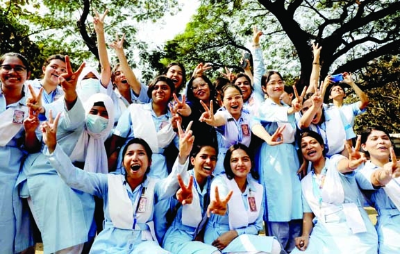 Students of Viqarunnisa Noon School and College in Dhaka cheer after getting the results of the Higher Secondary Certificate (HSC) and equivalent exam (2022) on Wednesday. NN photo