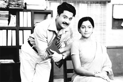 Gazi Abdun Noor and Nipun Akter in a scene from the government granted movie 'Bhashar Jonnyo Momtaz.’ Both Noor and Nipun are seen at a photo session in the shooting spot.